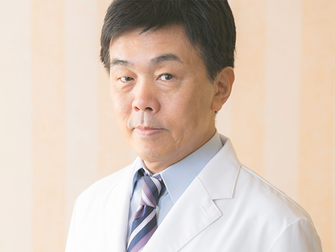 歯科医師 上西雅一
